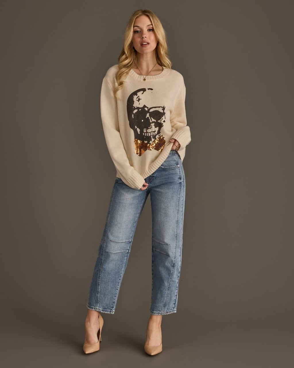 Dressed to Thrill Sequin Bow Sweater