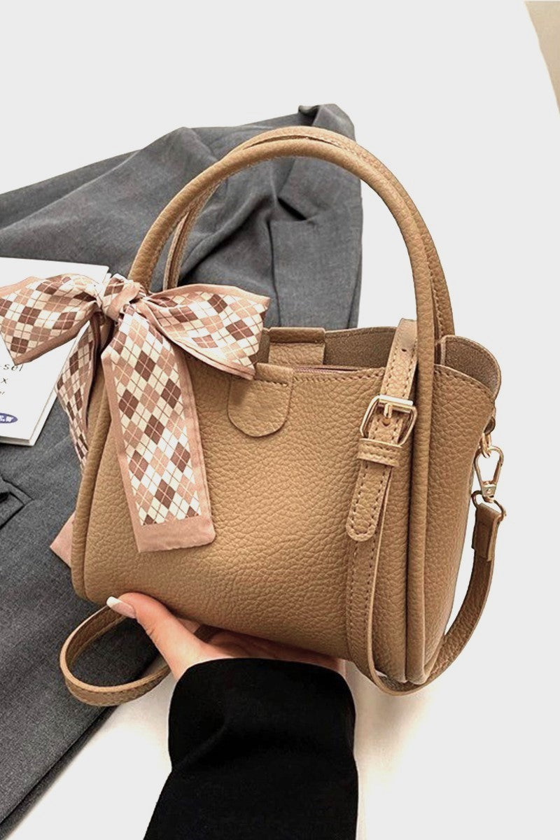 THE HOLLACE CROSSBODY TOTE BAG